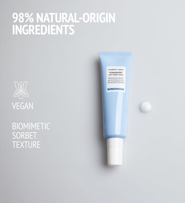 Hydramemory Light Sorbet Cream | [ comfort zone ] skincare product in a light blue tube with a drop of cream beside it, highlighting natural-origin ingredients, vegan formula, and biomimetic sorbet texture.