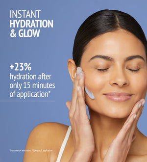 Smiling woman with clear skin gently applying Hydramemory Hydra Plump Mask | [ comfort zone ] on her cheek, promoting instant hydration and glow for skincare.