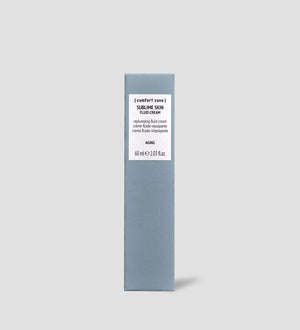 Minimalist packaging of Sublime Skin Fluid Cream | [ comfort zone ] in a matte grey rectangular box designed for skincare and body care products at Live Love Spa.