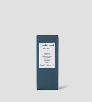 Packaging of Renight Oil | [ comfort zone ] in a minimalistic dark blue box with a white label displaying product details for skincare night use.