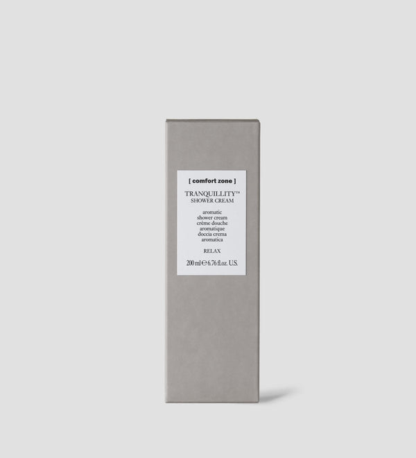 Minimalist grey rectangular box packaging of Tranquillity Shower Cream | [ comfort zone ] with clean white label, promoting a skincare product for body care and wellness.
