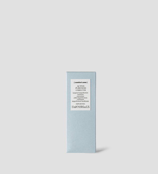 Minimalist light blue packaging of Active Pureness Corrector | [ comfort zone ], a targeted skincare product for imperfections and blemishes.