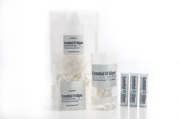 Various containers and tubes of Essential Wipes Plus PRO Pak - 350 qty | Functional Botanicals arranged on a white surface, showcasing the product packaging for skincare and wellness.