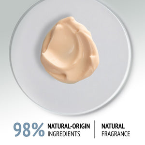 Creamy beige texture of Sublime Skin Fluid Cream | [ comfort zone ] displayed on a clear surface, highlighting its smooth consistency and natural skincare ingredients.