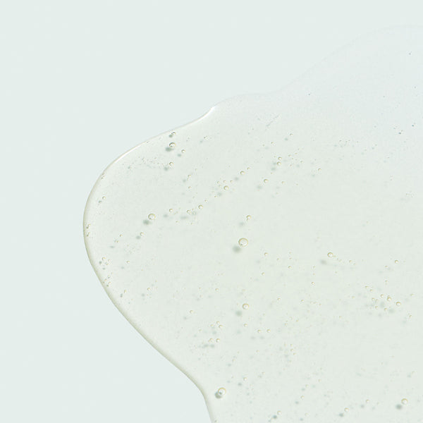 Clear gel texture of AGELESS total anti-aging serum | IMAGE Skincare shown on a light background, highlighting its smooth and hydrating skincare formulation.