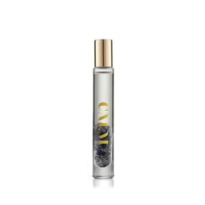 Calm RollerBall | Aluminate Life wellness supplement in a clear glass bottle with gold cap, featuring natural stones inside, designed for calming and relaxation.