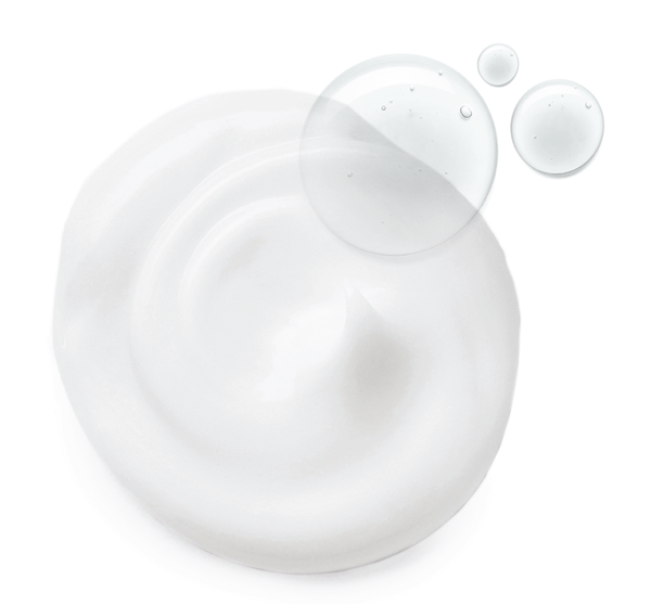 Swirl of creamy white skincare product with clear droplets, representing the texture of Bronze Fox® Tanning Drops | Farmhouse Fresh for body care and wellness.