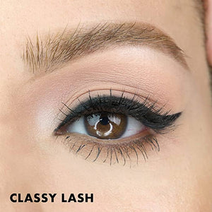 Close up of a brown eye with dramatic black false lashes and winged eyeliner, with Classy Lash | Moxielash text displayed below.