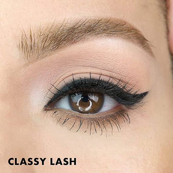 Close up of a brown eye with dramatic black false lashes and winged eyeliner, with Classy Lash | Moxielash text displayed below.