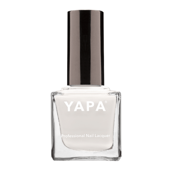 Clear glass bottle of Connie (Color: White) Nail Lacquer | YAPA with black cap featuring a sleek, professional design for premium nail care and polish application.