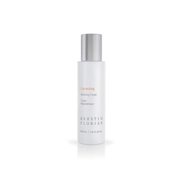 Bottle of Correcting Refining Toner | Kerstin Florian skincare product with silver cap on white background, promoting skin renewal and refinement.