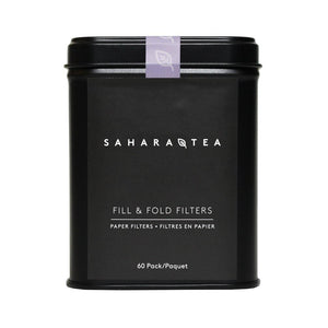 Black square tin container labeled with Sahara Tea, holding 60 Fill and Fold Tea Filters in Tin | Sahara Tea for convenient and eco-friendly tea brewing.