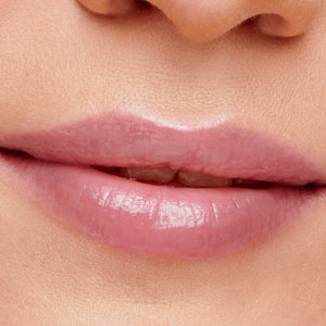 Close-up of soft, natural lips with a subtle shine showcasing Hydropure Hyaluronic Lip Gloss | Jane Iredale for hydrated, glossy lip care.