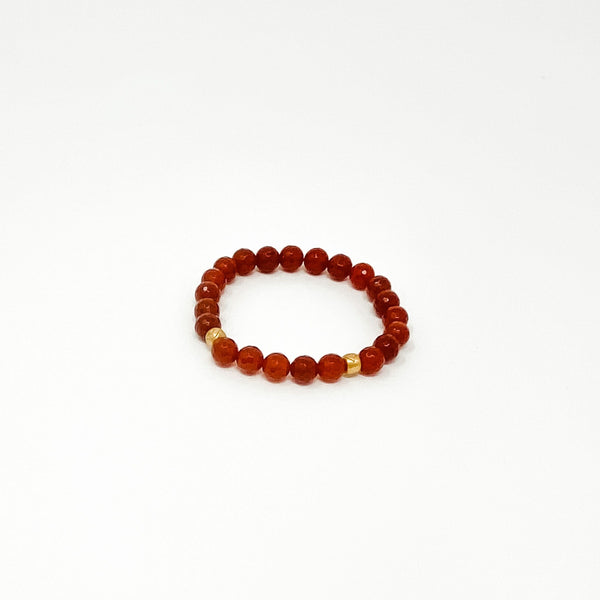 Assorted Satya Bracelets | Satya featuring polished red beads with gold accents, designed for style and wellness.