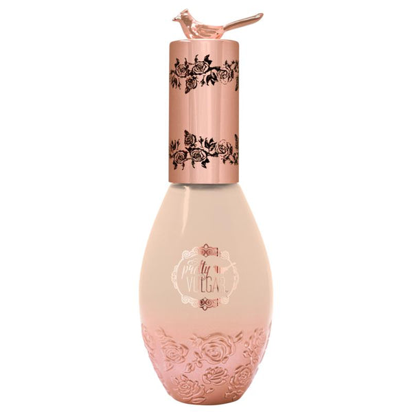 Elegant bottle of Cool AF Lava Water Foundation | Pretty Vulgar with rose gold embossed floral design and bird-shaped cap, highlighting skincare and beauty wellness.