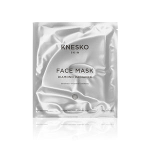 Packaging of Diamond Radiance Face Mask - Single | Knesko in a sleek, silver foil pouch designed for skincare hydration and radiance enhancement.