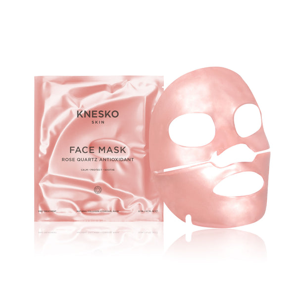 Packaging and a pink rose quartz antioxidant face mask sheet laid out flat, showcasing skincare product Rose Quartz Antioxidant Face Mask - Single | Knesko for calming and soothing skin.