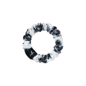 LOOP 3 pc | invisibobble black and white tie-dye fabric scrunchie with small black tag featuring white cursive lettering, designed for gentle hair styling and wellness.