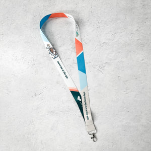 Lanyard - Massage Lover, Color Block and Live Love Spa | Lucky Owl featuring a colorful geometric pattern with blue, orange, and white sections, designed for wellness and spa enthusiasts.