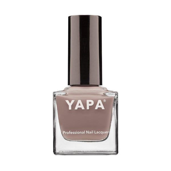 Bottle of MOM Nail Lacquer | YAPA in a muted mauve shade with a shiny black cap against a white background.