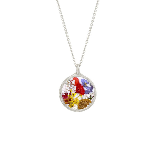 Small Botanical Necklace | Catherine Weitzman Jewelry featuring a delicate silver pendant encasing a colorful assortment of preserved flowers on a fine chain.