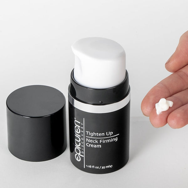 Open black pump bottle of Tighten Up Neck Firming Cream | Epicuren with a small amount of cream on a fingertip, showcasing skincare product for neck firming.