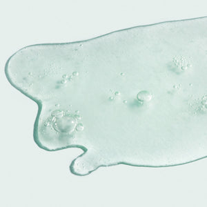 Clear gel texture with small air bubbles representing the lightweight consistency of ORMEDIC balancing antioxidant serum | IMAGE Skincare for skincare and wellness.