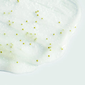 Close-up of clear gel with small green beads spread on a light surface, showcasing texture of ORMEDIC balancing gel polisher | IMAGE Skincare for skincare and wellness care.