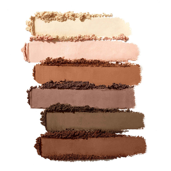 Close-up of six swatches in soft natural matte shades showcasing the Purepressed Eye Shadow Palette | Jane Iredale with colors ranging from light cream to deep brown for versatile, elegant eye makeup looks.