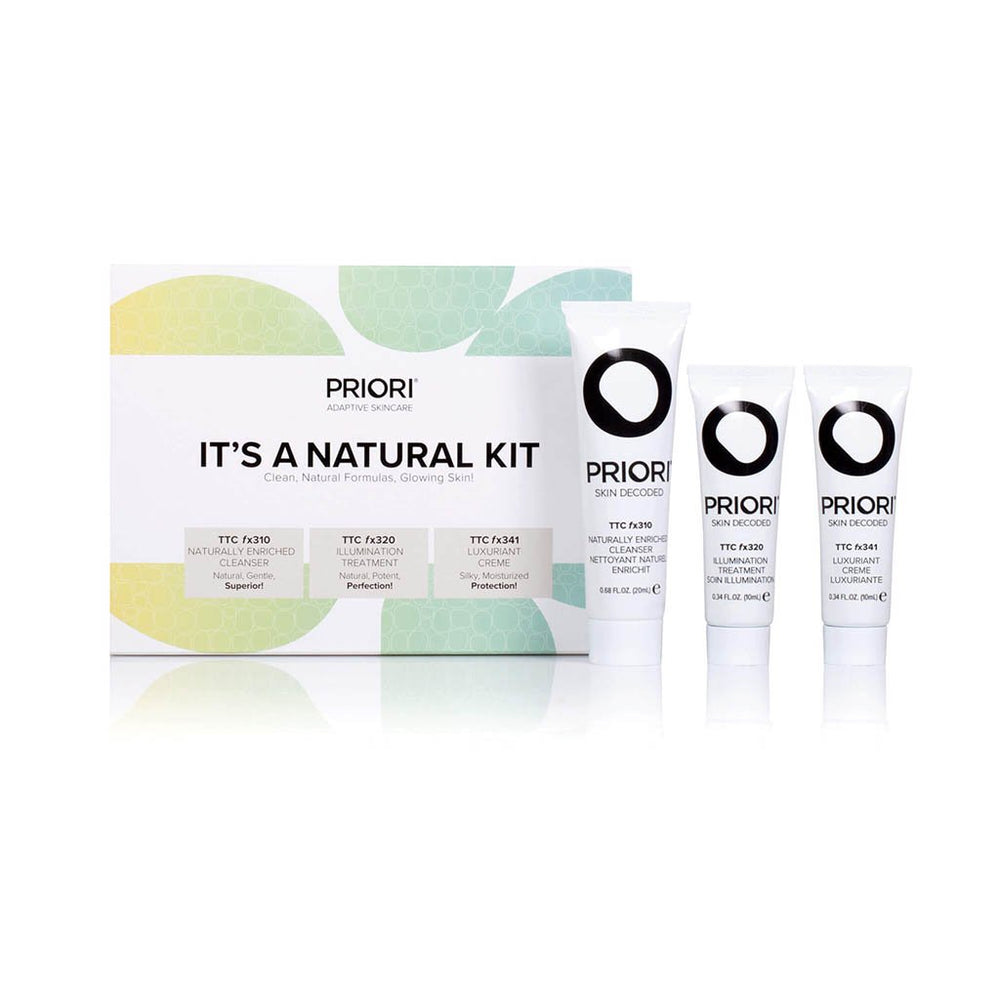 Set of natural skincare tubes and box labeled It’s A Natural Kit | Priori Skincare featuring clean, natural formulas for glowing skin in a minimalist design.