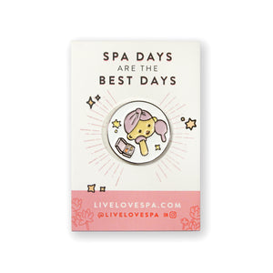 Fab Spa Life Enamel Pin - Limited Edition | Lucky Owl featuring a cute owl wearing a pink spa headband, holding a brush and jar of skincare cream, promoting wellness and self-care.