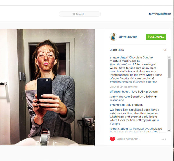 Woman taking a mirror selfie with Sundae Best® Chocolate Softening Mask with CoQ10 | Farmhouse Fresh applied to her face, showcasing skincare and self-care routine.