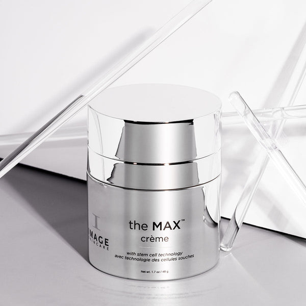 the MAX™ crème | IMAGE Skincare in a reflective silver container, showcasing advanced skincare technology with a clean, minimalistic background ideal for wellness and body care promotion
