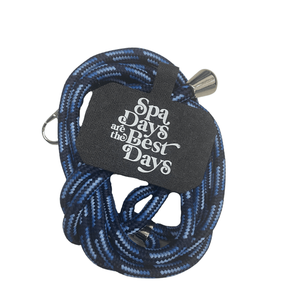 Crossbody Phone Lanyard With Adjustable Strap | Live Love Spa in blue and black braided design featuring a black pouch with white text reading "Spa Days are the Best Days