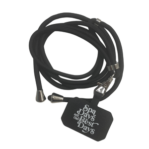 Crossbody Phone Lanyard With Adjustable Strap | Live Love Spa featuring a black adjustable cord and a tag with the phrase "Spa days are the best days" for convenient hands-free phone carrying.