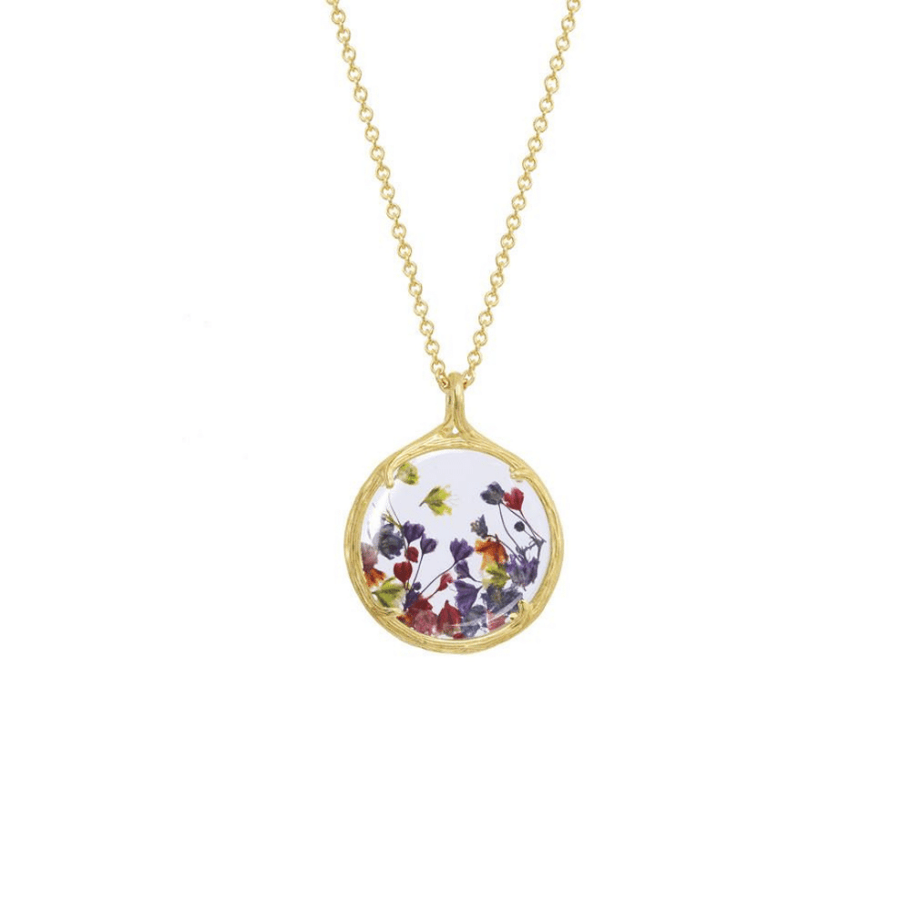 Small Botanical Necklace | Catherine Weitzman Jewelry featuring delicate blue pressed flowers encased in a round gold pendant on a fine gold chain, elegant and nature-inspired.