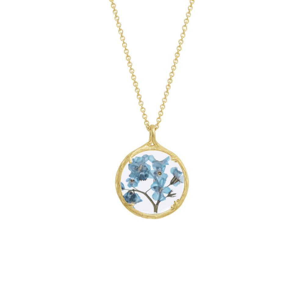 Small Botanical Necklace | Catherine Weitzman Jewelry featuring delicate blue pressed flowers encased in a round gold pendant on a fine gold chain, elegant and nature-inspired.