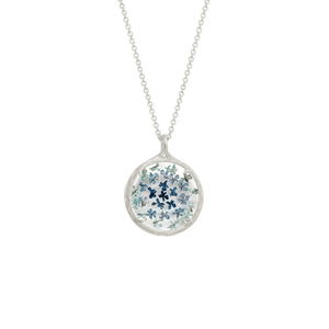 Small Ombre Botanical Necklace | Catherine Weitzman Jewelry featuring delicate blue and green floral designs encased in a round silver pendant on a fine chain.