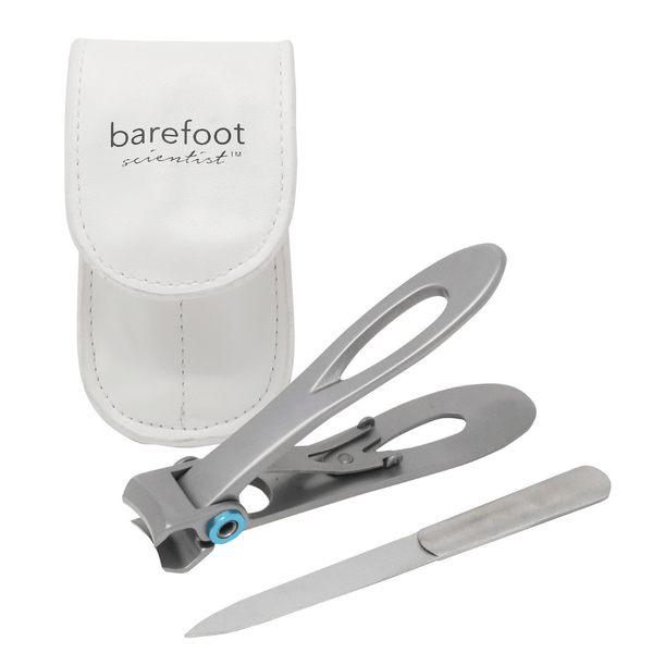 Clip Clip | Barefoot Scientist nail clipper set with ergonomic silver clipper, nail file, and white leather carrying case for personal grooming and body care wellness.