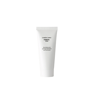 Tube of Essential Scrub | [ comfort zone ] skincare product with minimalistic white packaging for body care and wellness routines.