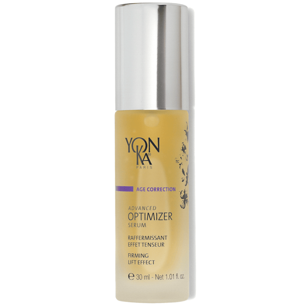 Bottle of Advanced Optimizer Serum – Anti-Aging, Firming Serum | Yon-Ka Paris, a skincare product with firming lift effect in a frosted glass bottle and silver cap.