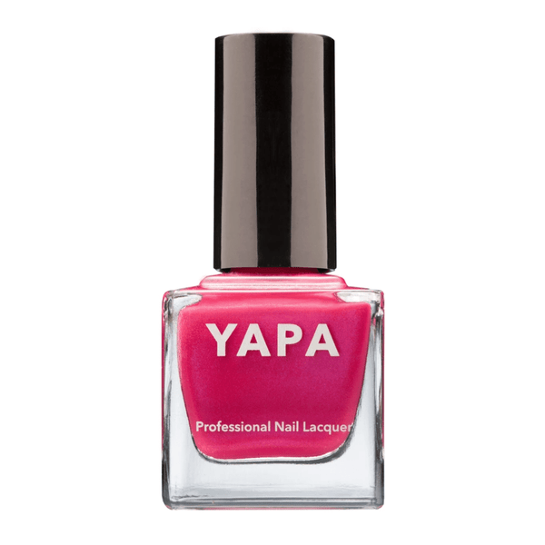 Bottle of Holly Nail Lacquer | YAPA in a vibrant pink shade with a black cap, featuring a professional nail lacquer label on the clear glass container.