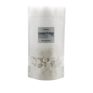 Clear resealable pouch of white round Essential Wipes Plus PRO Pak - 350 qty | Functional Botanicals with visible embossed tabs inside for skincare and wellness use.