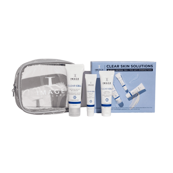 CLEAR SKIN SOLUTIONS Blemish Defense Trio | IMAGE Skincare set includes skincare products and a transparent pouch, designed for blemish control and clear skin maintenance.