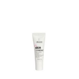 Tube of ORMEDIC sheer pink lip enhancement complex | IMAGE Skincare product, designed for lip care and enhancement, displayed on a white background.