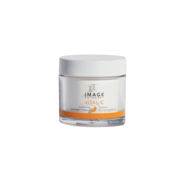 Small clear jar of VITAL C hydrating overnight masque | IMAGE Skincare with white cream and white lid against a white background