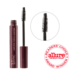 Amplified Tubing Mascara | Blinc with a close-up of the mascara wand showing dense bristles designed for volumizing lashes, featuring an Allure Readers’ Choice Award badge.