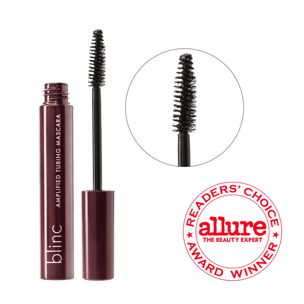 Amplified Tubing Mascara | Blinc with a close-up of the mascara wand showing dense bristles designed for volumizing lashes, featuring an Allure Readers’ Choice Award badge.