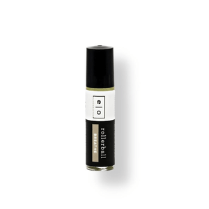 Breathe Rollerball - Respiratory Support | Essence One in a sleek black and white container, designed for wellness and respiratory relief with a convenient rollerball applicator.