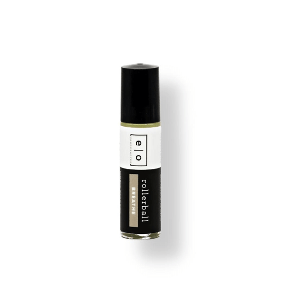 Breathe Rollerball - Respiratory Support | Essence One in a sleek black and white container, designed for wellness and respiratory relief with a convenient rollerball applicator.